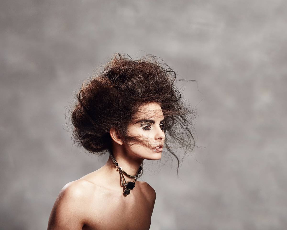 Girl wearing pearl barrettes in half-up hairstyle demonstrating secure hold and elegant finish